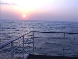 The sun sets over the North Sea as we head for Norway